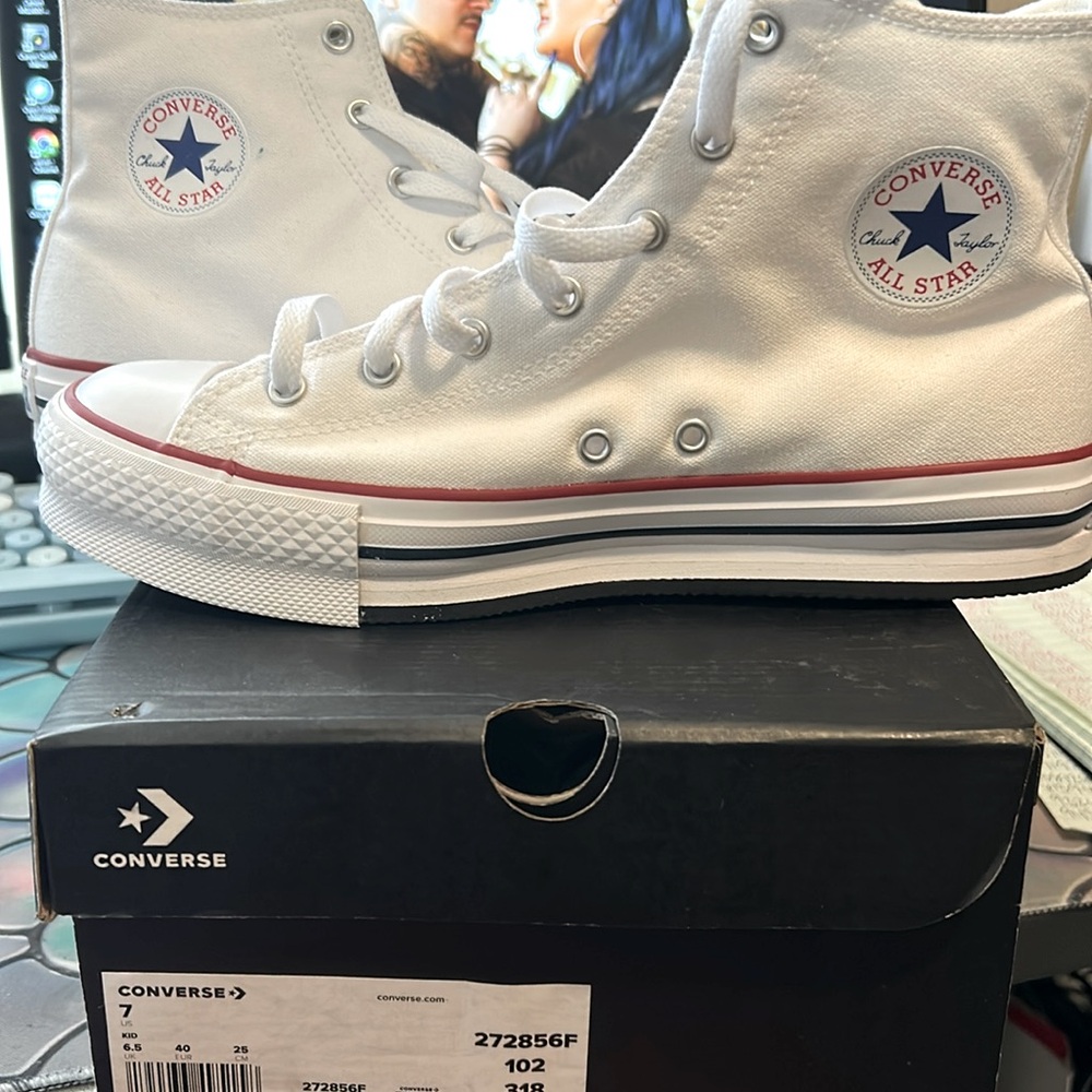 Brand new converse in box .